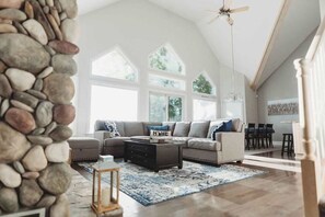 TV, fireplace, books, offices - Lakefront Home w/ Hot Tub | Perfect for Families & Groups (Central Lake)