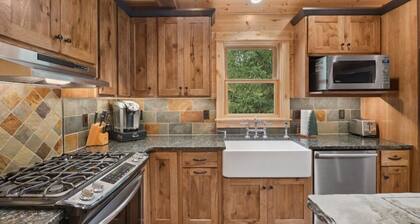 Secluded cabin with your own pond. Waterfront steps away. 30min to ski big mtn