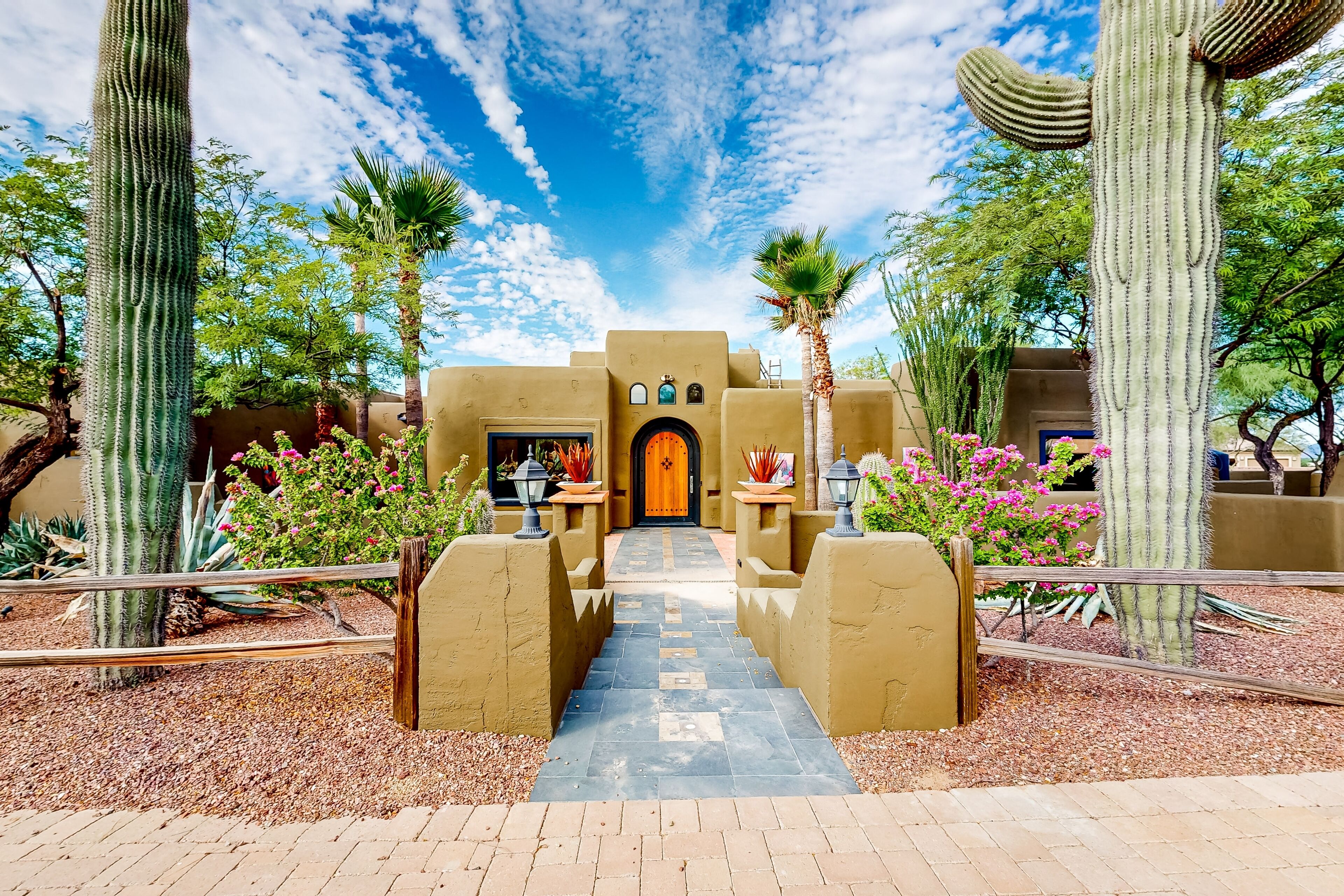 Dog-friendly oasis home with a private pool, pool spa, putting green, & W/D