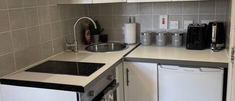 Fridge, oven, electric kettle, toaster