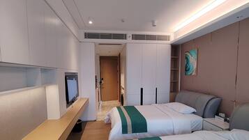 Lägenhet Comfort | 1 sovrum, bäddmadrasser, skrivbord och arbetsyta för laptop