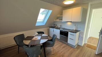 Comfort-værelse til 4 personer | Privat køkken | Elkedel