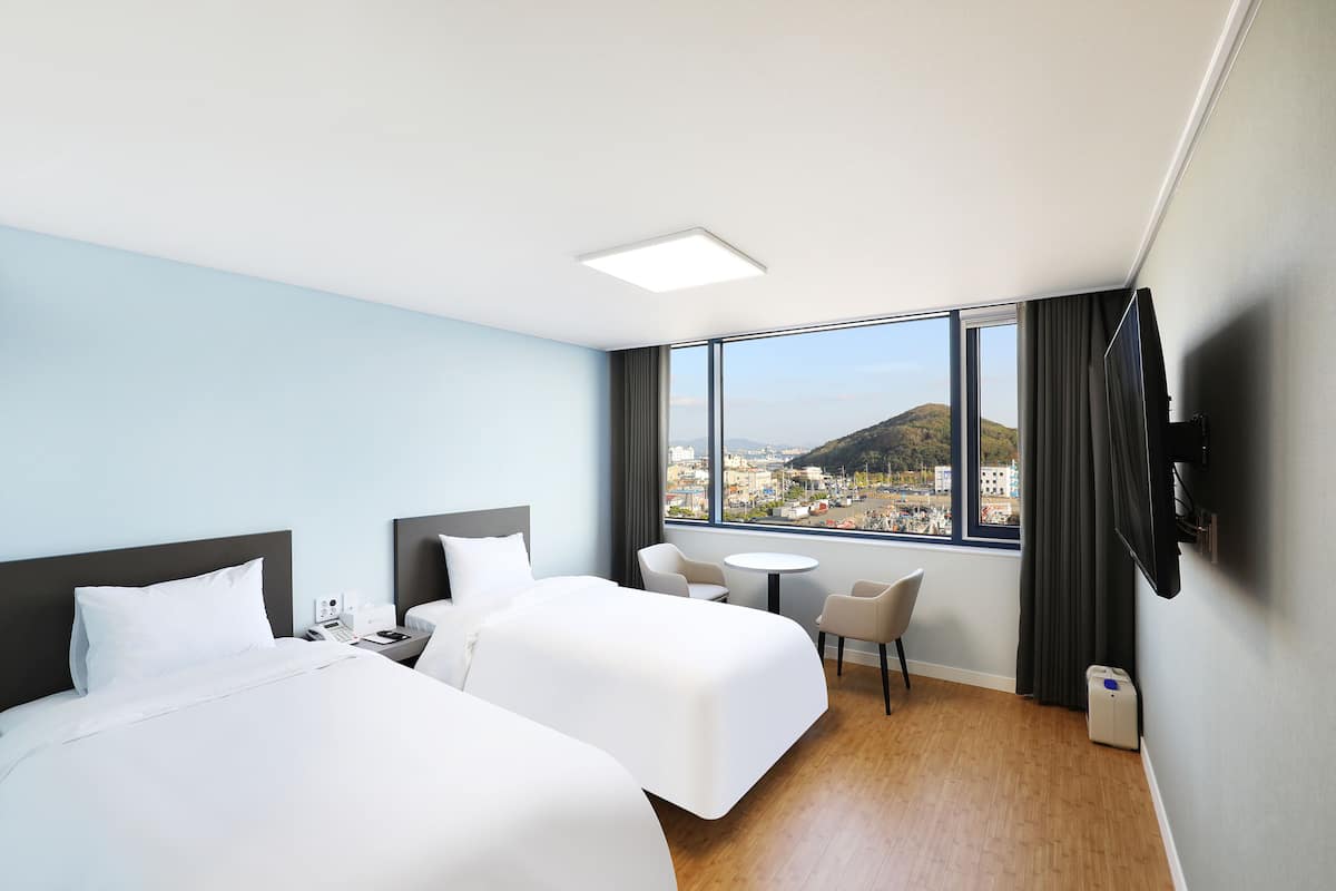 2 habitaciones, ropa de cama hipoalergénica y cortinas blackout