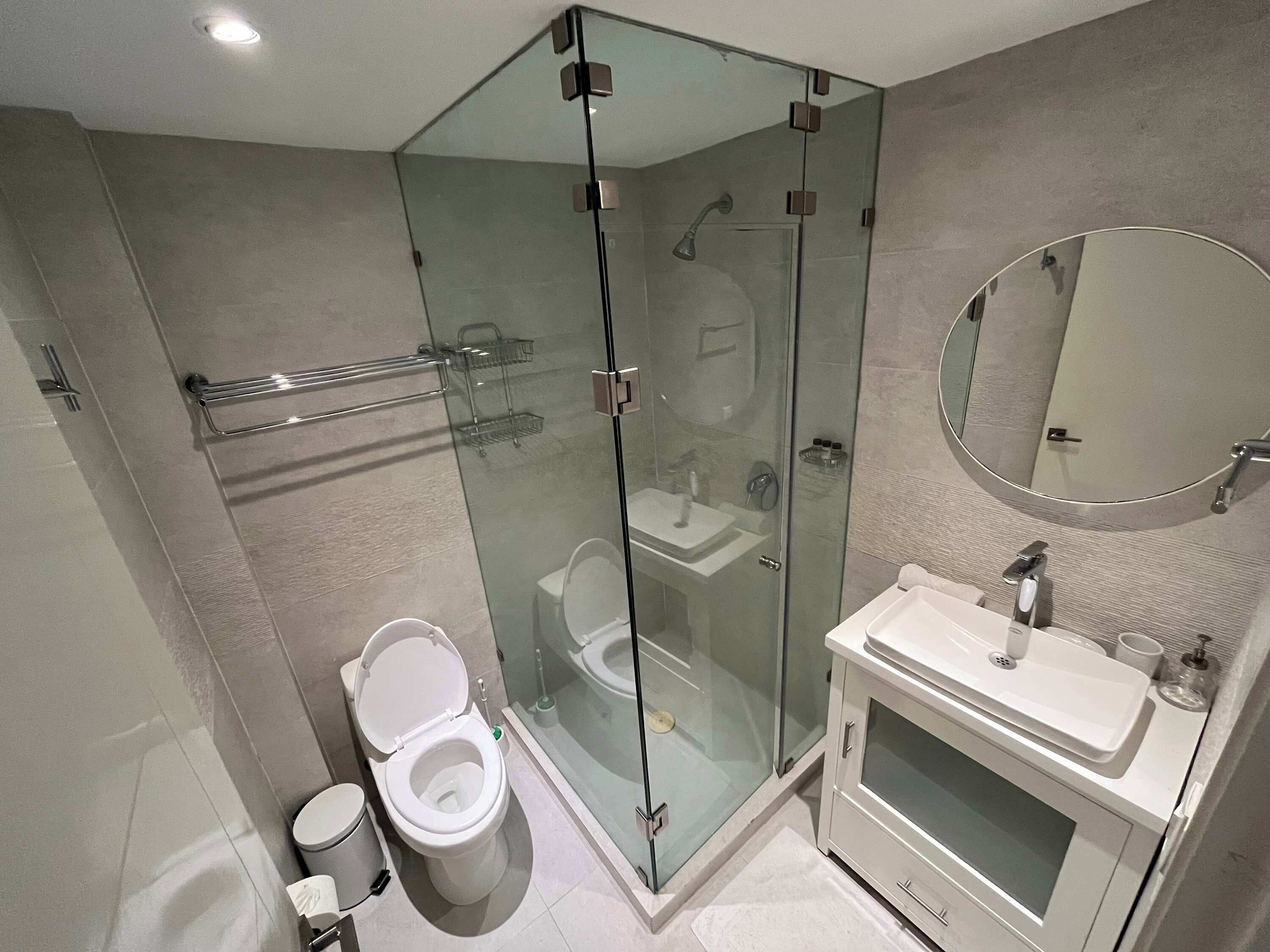 Shower, hair dryer, towels, shampoo