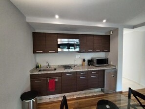 Microwave, stovetop, coffee/tea maker, toaster