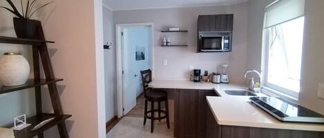 Microwave, stovetop, coffee/tea maker, toaster