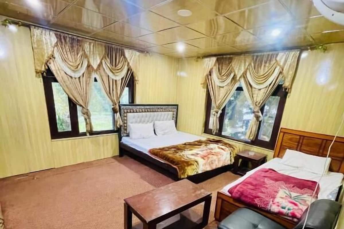 Habitación Deluxe con 1 cama matrimonial o 2 individuales | Insonorización, tabla de planchar con plancha y wifi gratis