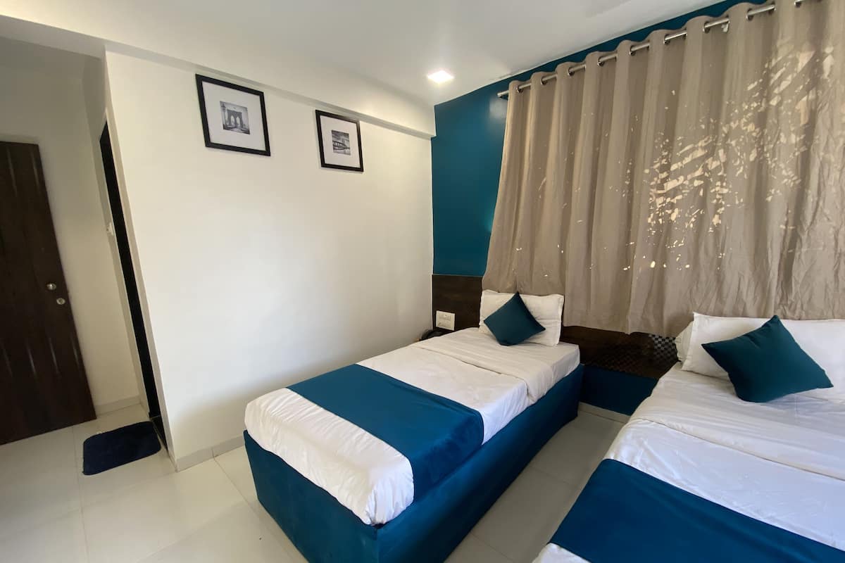 Chambre Deluxe avec lits jumeaux | Bureau, espace de travail pour ordinateur portable, Wi-Fi gratuit