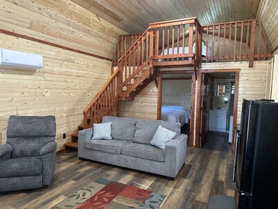 Tan cabin close to University of Central Missouri and Whiteman AF Base 