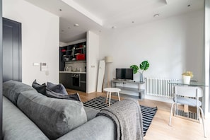 Basic Apartment, 1 Double Bed | Living area | TV - Modern Canning Town Studio (London)
