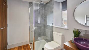 Bathtub, hair dryer, towels, soap