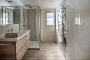 Hair dryer, bidet, towels, soap