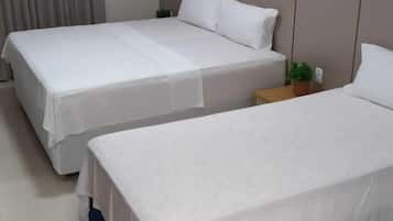 Basic Twin Room | 1 bedroom, down comforters, desk, laptop workspace