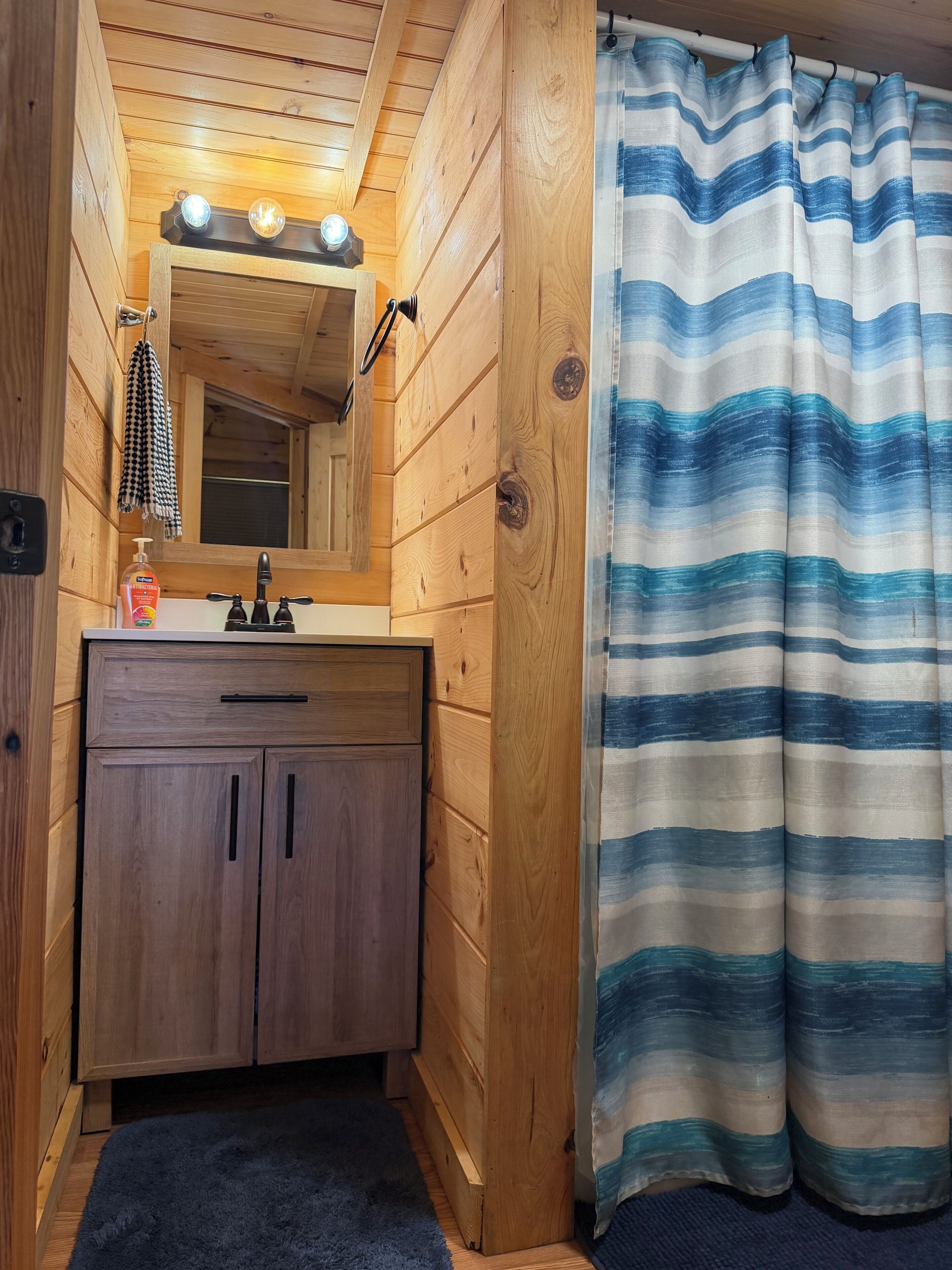 Shower, towels, soap, toilet paper