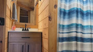 Shower, towels, soap, toilet paper