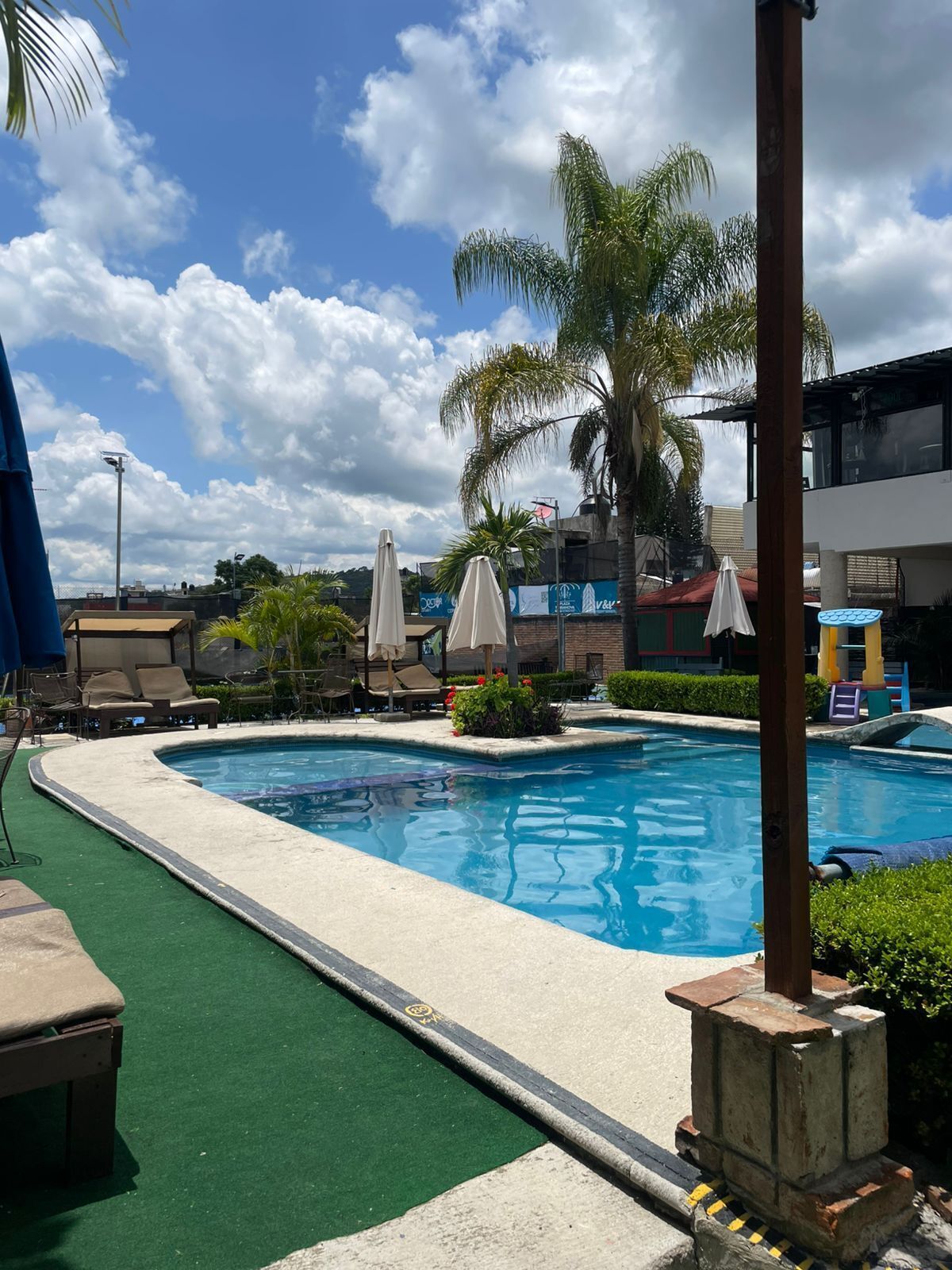 Outdoor pool, open 8:00 AM to 9:00 PM, pool umbrellas, sun loungers