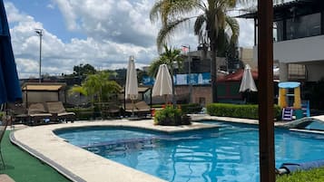 Outdoor pool, open 8:00 AM to 9:00 PM, pool umbrellas, sun loungers