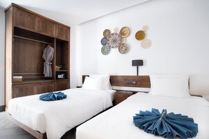 Ropa de cama de alta calidad, colchones con pillow-top y minibar 