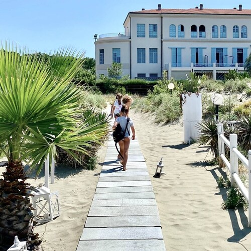 LODGE4 | Beach front with pool in historic building | Romantic + family friendly