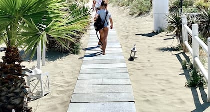 LODGE4 | Beach front with pool in historic building | Romantic + family friendly