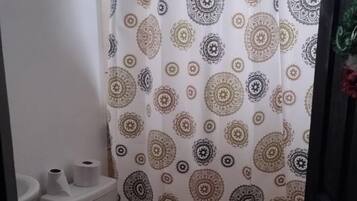Basic Single Room, 1 Bedroom, Non Smoking | Bathroom | Bathtub, towels, soap, toilet paper