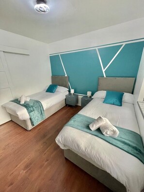 4 dormitorios, tabla de planchar con plancha, wifi y ropa de cama