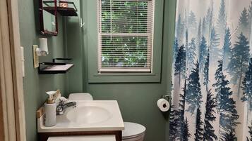 Bathtub, hair dryer, towels