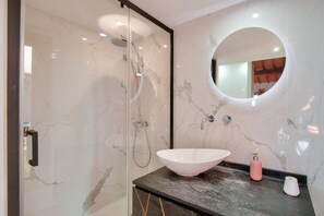 Shower, hair dryer, towels, soap
