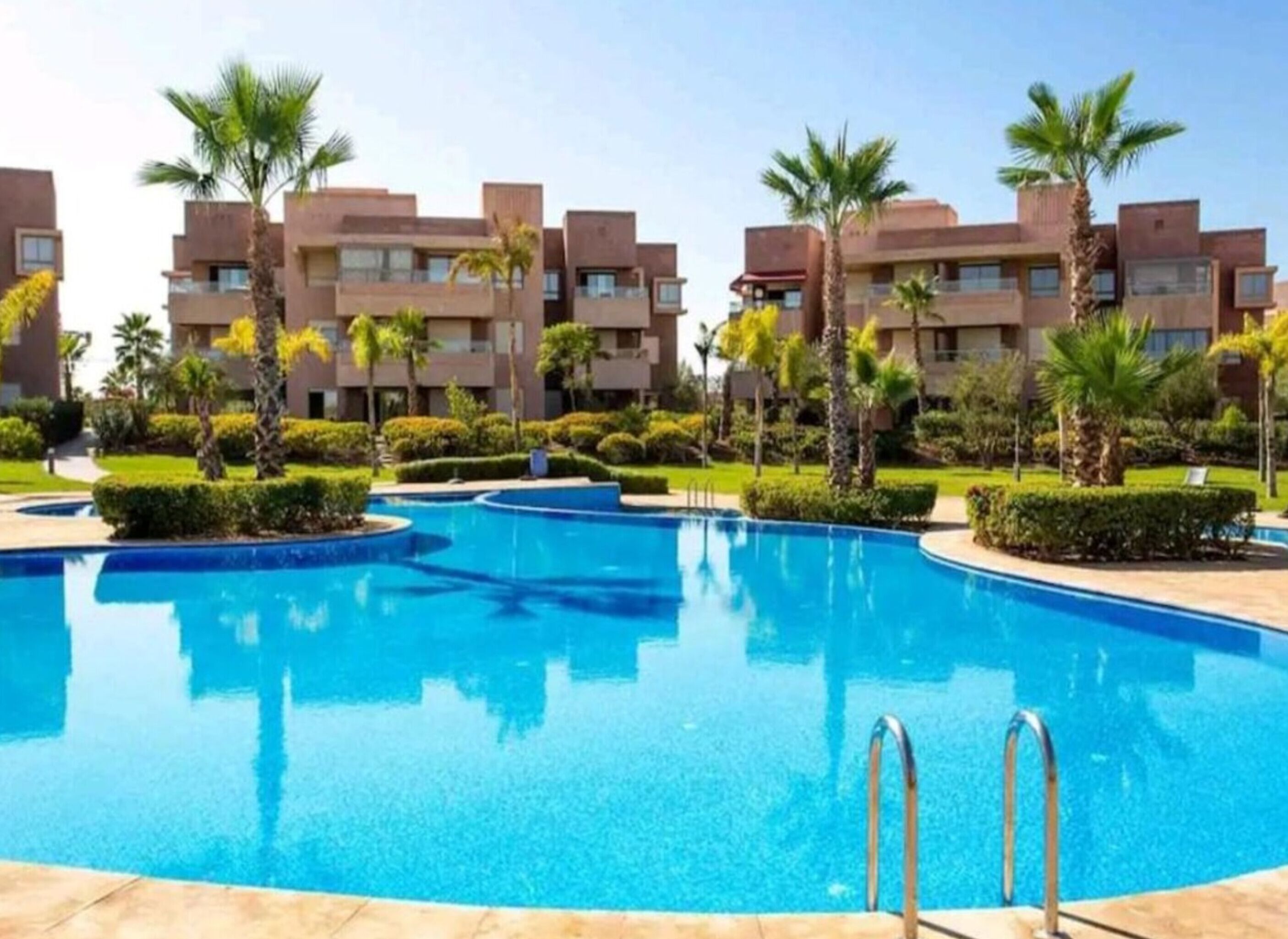 Exclusive Condo, 2 Bedrooms, Pool View, Garden Area | Living area | 55-inch Smart TV with cable channels