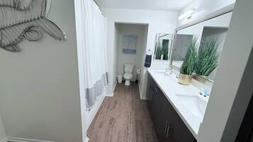 Hair dryer, towels, soap, toilet paper
