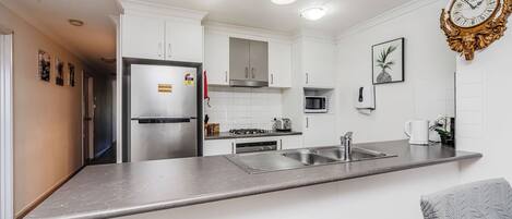 Fridge, microwave, oven, stovetop