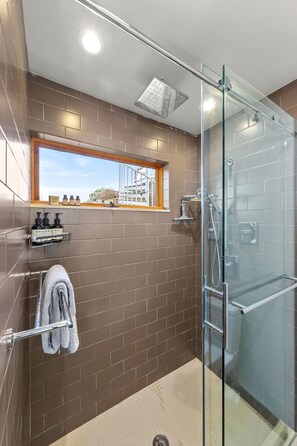 Shower, hair dryer, towels, soap