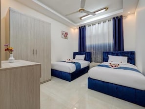 3 habitaciones, tabla de planchar con plancha, wifi y ropa de cama