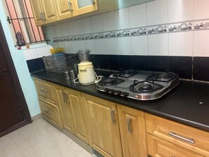 Fridge, stovetop, electric kettle, blender