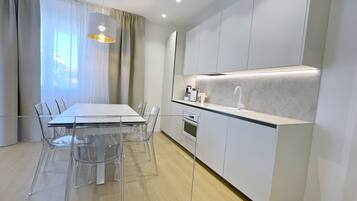 Apartment | Private kitchen | Full-size fridge, oven, stovetop, dishwasher