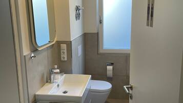 Hair dryer, towels, toilet paper