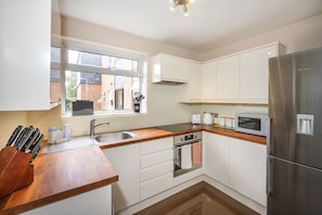 Apartment | Private kitchen | Fridge, microwave, oven, stovetop
