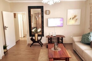 Casa, varias camas | Área de sala de estar