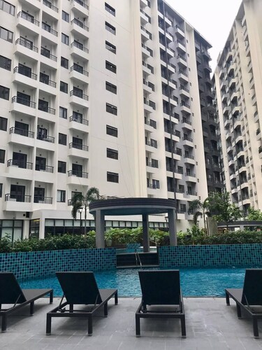 Homey Condo @Spring Residences beside SM Bicutan