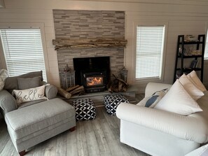 Smart TV, fireplace, books