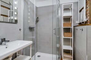 Shower, towels, soap, shampoo