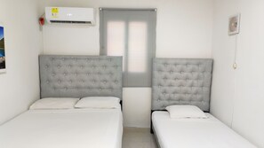 2 habitaciones, tabla de planchar con plancha y wifi gratis 