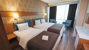 Chambre Économique Double ou avec lits jumeaux | Draps en coton égyptien, literie de qualité supérieure