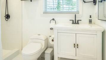 Shower, hair dryer, towels, soap