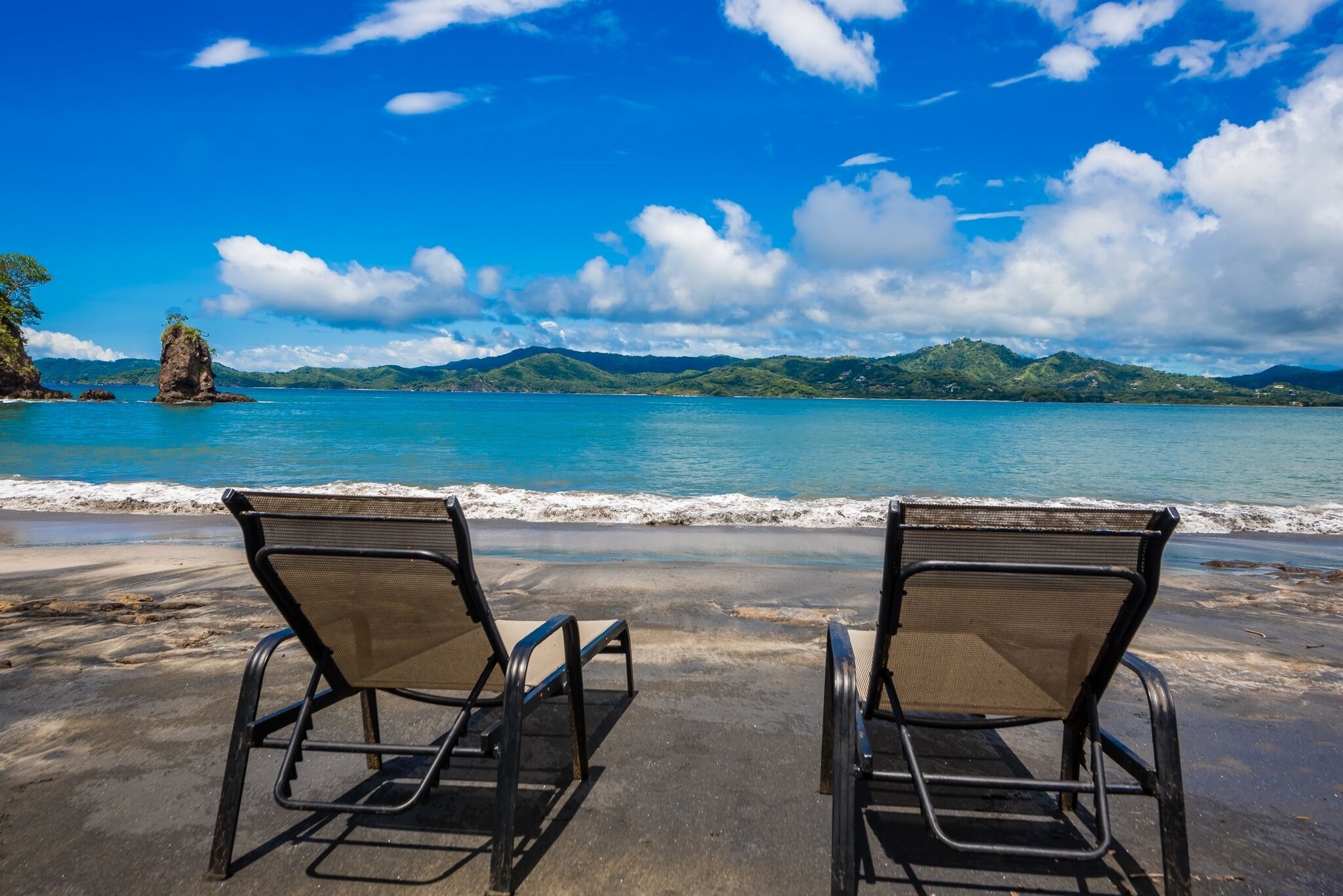 On the beach, sun-loungers, beach towels