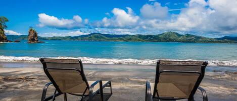 On the beach, sun-loungers, beach towels