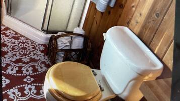 Shower, towels, soap, toilet paper