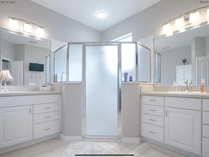Shower, hair dryer, towels, soap