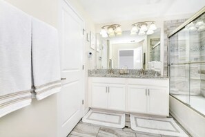 Hair dryer, towels, soap, shampoo