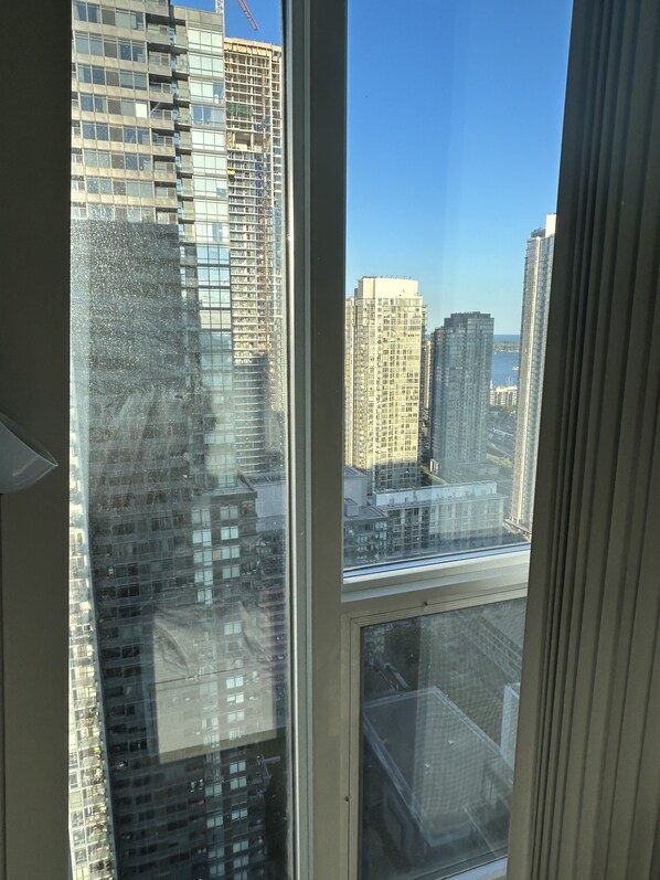 Panoramic views of the city skyline and water can be seen from this high-rise building.